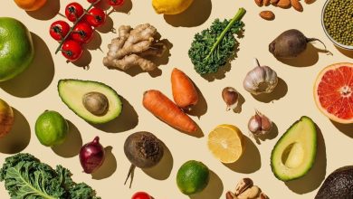Pattern of variety fresh of organic fruits and vegetables and healthy vegan meal ingredients on beige background. Healthy food, clean eating, diet and detox, eco friendly, no plastic concept . Flat lay, top view