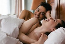 playful couple in bed 1200x628 facebook 1200x628