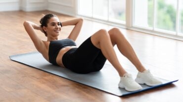 Woman doing crunches Woman doing crunches