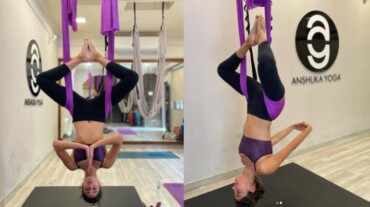 A woman doing aerial yoga A woman doing aerial yoga