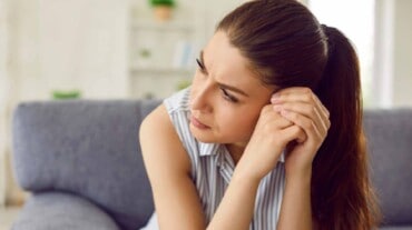 A woman thinking of something sad A woman thinking of something sad